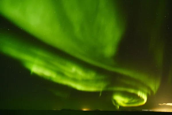 Aurora Borealis or Northern lights over atlantic ocean in Iceland